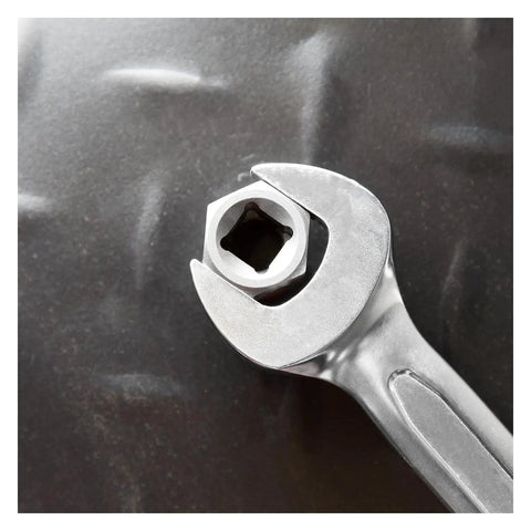 Wrench holding bolt attached to Spiral Type Deep Bolt Extractor Set, Five Piece, Chrome Vanadium Steel Construction tool.