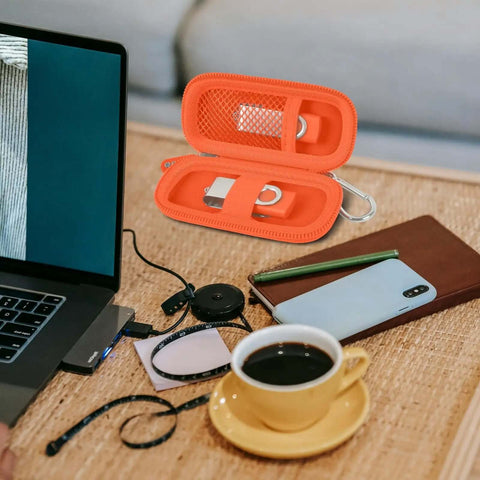 Dang Solid USB Flash Drive Case Plus SD Card Holder Bag For Thumb Drives Hella Secure Memory Card Pouch open with drives inside on a desk.