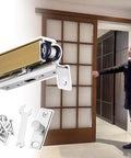 Soft Close And Open Interior Sliding Door Rail Kit With Hardware, Bypass Barn Door Hidden Track System, Heavy Duty Pocket Door Roller Set For Closet Or Barn Doors, Champagne Finish, Silent Glide, Kid Safe, 152 Cm Long Doors 59.8 Inches displayed with installation tools and a man standing nearby