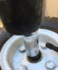 Close-up of tire rim showcasing the application of Internal Tooth Lock Washers Fasteners Kit 340pc Set with black locking washers.