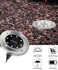 8 Pack Solar Ground Lights With 8 LED Upgraded Outdoor Garden Landscape Lighting on gravel pathway, aluminum alloy, waterproof.