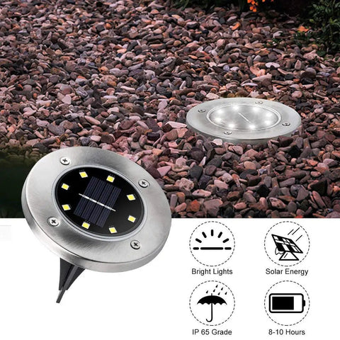 8 Pack Solar Ground Lights With 8 LED Upgraded Outdoor Garden Landscape Lighting on gravel pathway, aluminum alloy, waterproof.
