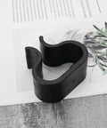 Pack Of 10 Non Slip Furniture Clips For Chairs And Sectionals Durable Patio Clip Set For Rattan And Garden Furniture Quick Alignment Connectors 6.8x6cm in black on paper background