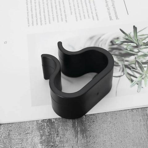 Pack Of 10 Non Slip Furniture Clips For Chairs And Sectionals Durable Patio Clip Set For Rattan And Garden Furniture Quick Alignment Connectors 6.8x6cm in black on paper background