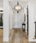 Modern Orb Chandelier With 3 Lights In Black And Gold, Frosted Glass Shades in foyer