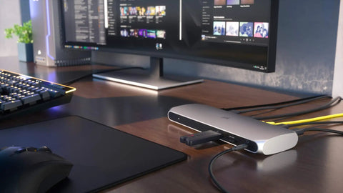 Thunderbolt 3 Dock For Laptop Users delivers snazzy desk setups with USB-C hub, connected to a laptop and monitor.