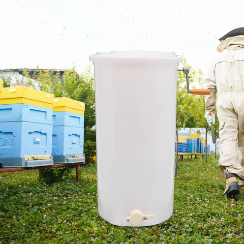 Two-Frame Manual Honey Extractor for Beekeeping, Durable Plastic Centrifuge Tool, White, Easy Grip S-Shaped Handle, Ideal for Home or Store Honey Harvesting, 15.75 by 28.35 Inches, in apiary
