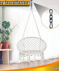Rock Solid Black 304 Stainless Steel Swivel Ring With Twist Resistant Dual Snap Hooks And Smooth Action Rotation For Tree Swing Hammock Heavy Duty Rigging M8 Size hanging from ceiling with swing seat.