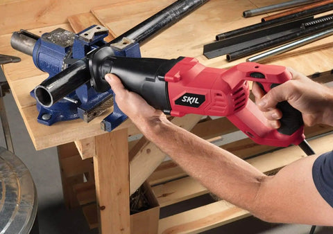 Beefy 9 Amp Reciprocating Saw For Tough Demolition Jobs With Tool Free Blade Change in action cutting metal pipe