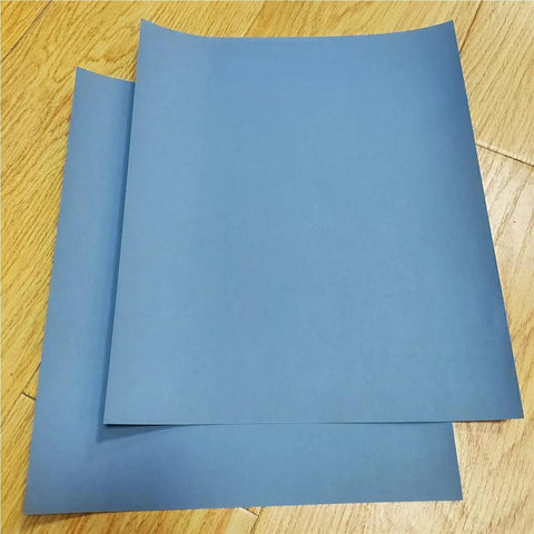 Close-up of blue 10 Pcs Assorted Wet Dry Sandpaper Sheets 280X230mm suitable for wood polishing and paint stripping.