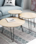 Round coffee tables with adjustable black iron furniture legs 35 cm tall, in a modern living room setup.