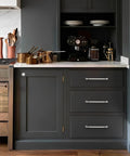 Dark kitchen cabinetry with 10 Pack 5 Inch Hole Center Cabinet Handles In Brushed Satin Nickel And Polished Nickel Finishes installed.