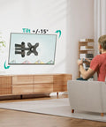 Full Motion Tv Wall Mount For 13 To 32 Inch Led Lcd Displays with tilt adjustment in a living room setting.