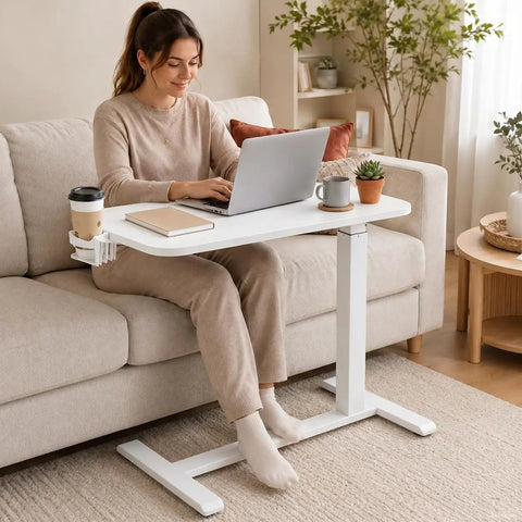 Mobile Rolling Desk Featuring Hidden Wheels And Smooth Pneumatic Height Adjustment Portable Laptop Stand For Home Office Or Bedside Setup Lightweight White Surface with a user working.