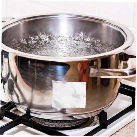 Leak Stop Tape For Pipe Repair White Insulated Waterproof Tape 1 Roll Stain Resistant And Heat Resistant 20m Length Heavy Duty Adhesive Sealant Tape For Leaks And Hoses applied on a stainless steel pot boiling on a stove.