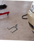 Heavy Duty Track Hooks 10 Piece Set For Truck Tie Down And Garage Organization displayed on garage floor.