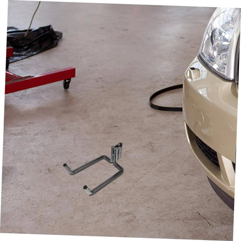 Heavy Duty Track Hooks 10 Piece Set For Truck Tie Down And Garage Organization displayed on garage floor.