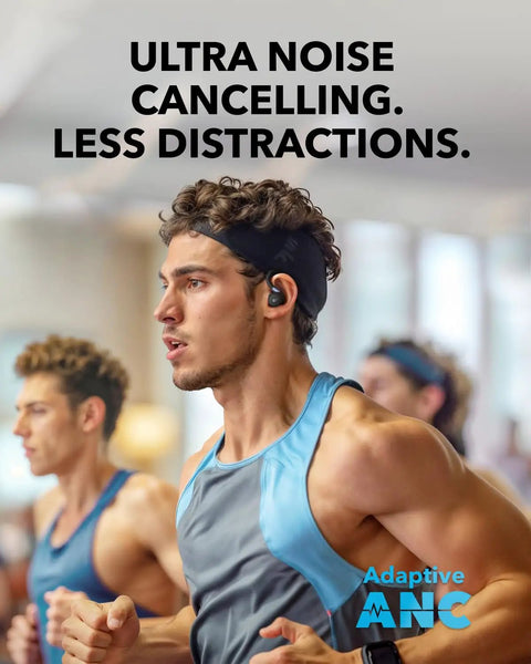 Man running indoors wearing Sport X20 True Wireless Workout Earbuds With Rotatable And Extendable Ear Hooks, Active Noise Cancellation