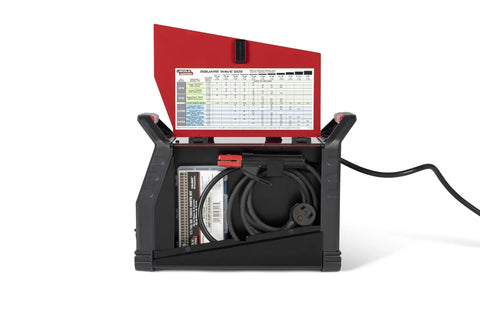 Open view of Square Wave 205 TIG Welder K5613 1 Portable TIG And Stick Welder with cables and instructions visible inside.