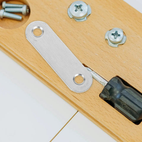 Flat Straight Brace Set 100 Pcs 2.2x0.6in Stainless Steel Shelf Brackets mounted on wooden surface