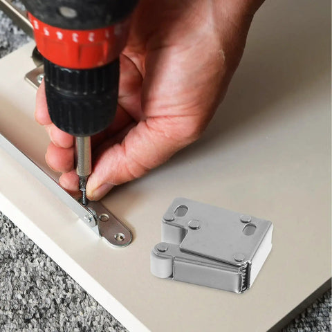 Installing Stainless Steel Door Roller Catch 2 Pack Press To Open Cabinet Latch With Nylon Wheel on a panel.