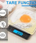 Ultra Precise Digital Kitchen Scale 3000g/0.1g with tare function, displaying 68.5g, holding ingredients in clear tray.