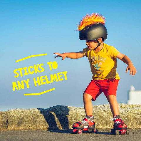 Child wearing iguana themed helmet mohawk accessory with sticky hook and loop fastener adhesive easy to attach and remove helmet not included dope mohawk cover for snowboarding skiing biking cycling and skating for kids and adults