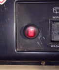 Close-up of red switch from 4 Lead LED Rock Light Wiring Harness Kit With 2 Extension Wires Relay Fuse And Switch For Offroad Pods