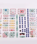 Ultimate STEM Electronics Kit For Kids Ages 8 And Up With 999 Projects In One Mega Circuit Set Includes 64 Components And Full Color Step By Step Manuals For Hands On Experiments Without Soldering Learn Physics And Electronics At Home. assorted circuit components laid out on white background