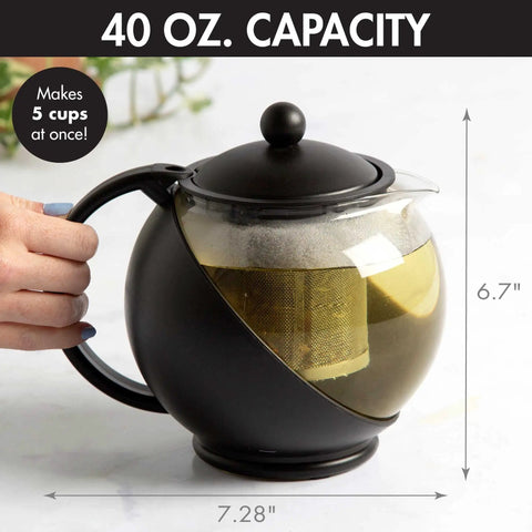 Hand holding a Half Moon Glass Teapot With Removable Infuser And Fine Mesh Stainless Steel Filter Dishwasher Safe 40 Ounce Black Tea Maker.