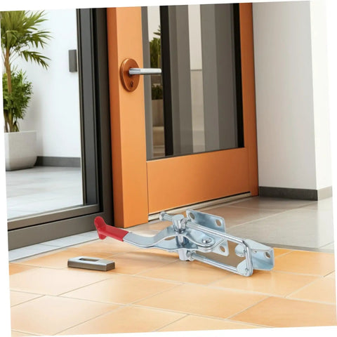 Super Heavy Duty Galvanized Iron Toggle Latch Clamps Hold 2183 Lbs With Quick Release Adjustments For Tool Boxes Drawers And Workshop Jigs That Rock mounted on floor by door.
