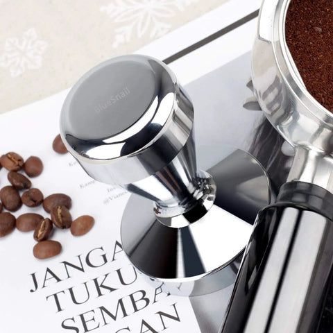 Stainless Steel Coffee Tamper 51mm Base Barista Espresso Press For Fresh Ground Beans Pro Grade Tamping Heavy Duty 570g Handle 80mm Height Ideal For Rich Even Extraction on magazine with coffee beans and portafilter.