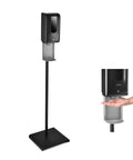 Solid Touchless Hand Sanitizer Dispenser On Heavy Duty Steel Floor Stand With Catch Tray And Refillable Bottle For No Sweat Hygiene Setup At Your Office Or Store with palm under dispenser.
