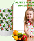 Child next to Dope Vertical Garden Tower With Fourteen Growing Levels Seventy Slots A Twenty Liter Water Tank and Pump