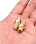 Two brass fittings from Pneumatic Exhaust Muffler Eight Piece Kit With One Eighth NPT Male Sintered Bronze Brass Fittings For Pneumatic Tools