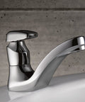 Commercial Chrome Metering Bathroom Sink Faucet M-Press Single-Mount 0.5 GPM installed on white sink