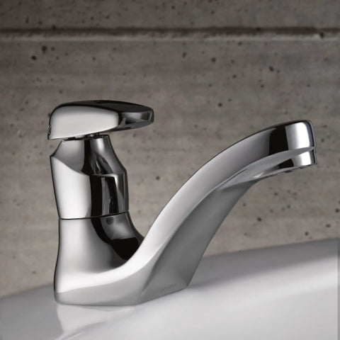 Commercial Chrome Metering Bathroom Sink Faucet M-Press Single-Mount 0.5 GPM installed on white sink