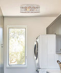Rustic Farmhouse 3 Light Flush Mount Ceiling Light with Metal Cage Drum Shade in bright laundry room.