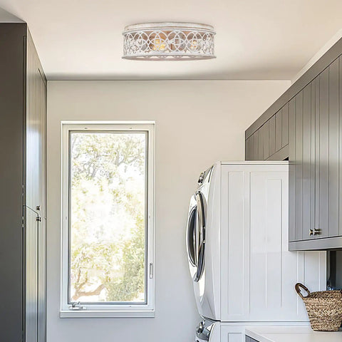 Rustic Farmhouse 3 Light Flush Mount Ceiling Light with Metal Cage Drum Shade in bright laundry room.