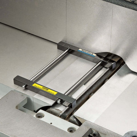 Magnetic Jointer Jig With Solid Steel Blade Setting Bars For 6 Inch To 8 Inch Jointer Beds in a metal jointer setup