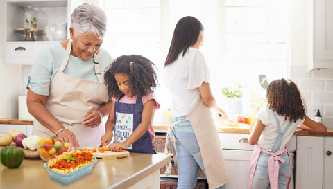 Family cooking with Indigo Collapsible Silicone Food Storage Container Set Of 8 BPA Free Microwave Safe Freezer Safe Dishwasher Safe