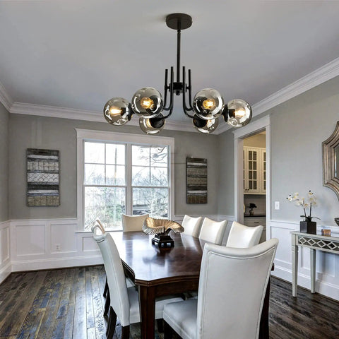 Six Light Glass Globe Sputnik Chandelier Modern Metal Black Ceiling Light Fixture above dining table in elegant room