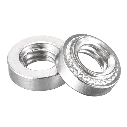 Built Different Stainless Steel Self Clinching Rivet Nuts With Smooth Round Head For Fast Thin Sheet Metal Assembly 10 32 Thread Pattern Zero Point One Four Inch Length Heavy Duty 50 Piece Fastener Set That Goes Hard On Any Rig, showing two metal nuts.