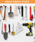 Heavy Duty Pro Grade Metal Pegboard Hooks 25 Pack, 4 Inch Peg Board Hangers holding tools against pegboard.