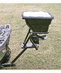UTV And ATV Receiver Mount Broadcast Spreader Seeder For Easy Lawn And Garden Seeding 80 Pound Capacity 12 Volt Power Quick Install Harness Rain Cover Included mounted on vehicle