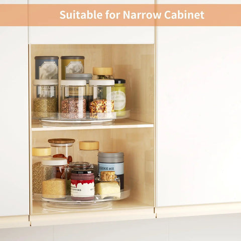 Two Pack Clear 9 Inch Lazy Susan Turntable Rotating Organizer Tray For Cabinet And Countertop Use Non Slip Round Spice Rack Refrigerator Kitchen Pantry Bathroom Storage displaying spices and jars in a narrow cabinet.