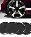 Premium 4 Pack Wheel Center Caps For Cars Trucks And Suv Snap In Rim Hub Covers in sleek black finish with shiny rim accents.