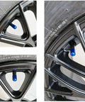 Close-up of Deep Blue 4 Pack Tire Valve Stem Caps Universal for Cars and Bikes on vehicle wheel