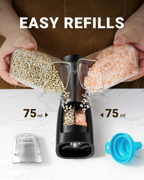 2 In 1 Rechargeable Salt And Pepper Grinder Set With USB C Charging Base being filled with salt and pepper, showing dual chambers.