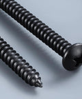 Number 12 By 1 Inch Pan Head Wood Screws With Phillips Drive Black Oxide Finished 304 Stainless Steel shown from the side.